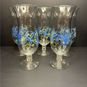 Set of 5 Blue and Yellow hurricane cocktail glasses from royal Caribbean cruise.